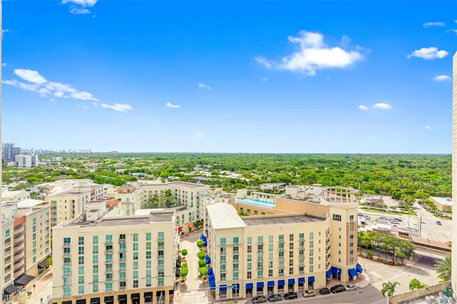a view of a city with tall buildings