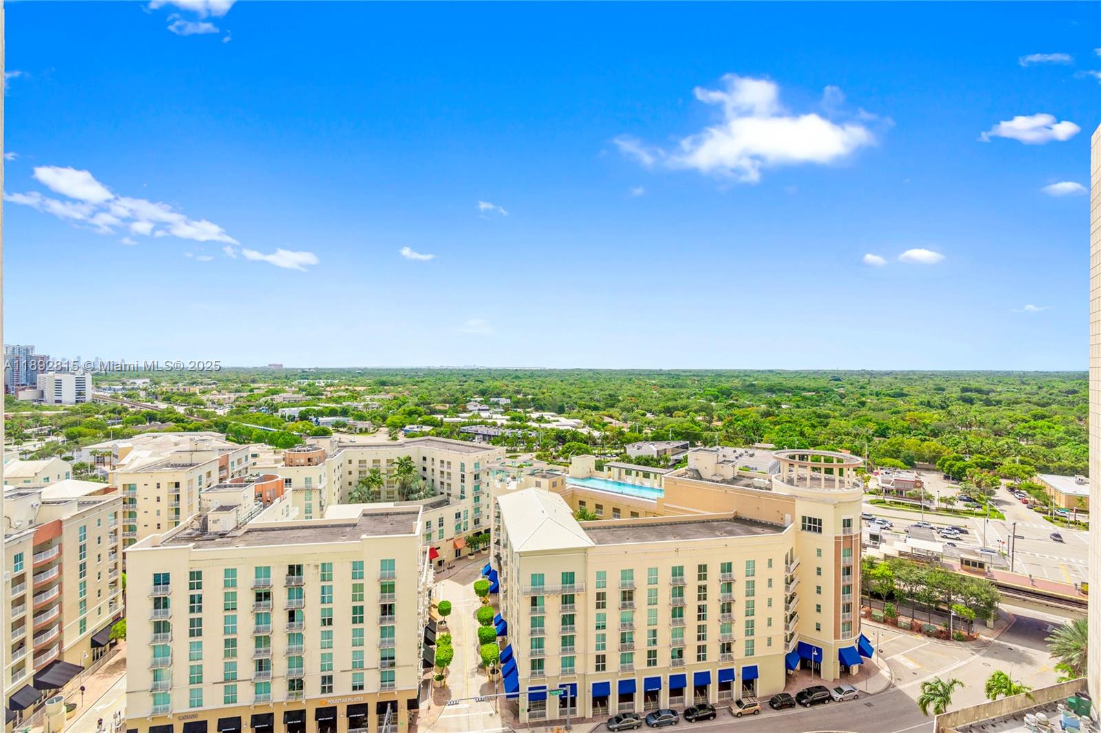 9055 Southwest 73rd Court, Unit 1502 Miami, FL 33156 - Photo 32 of 41 a view of a city with tall buildings