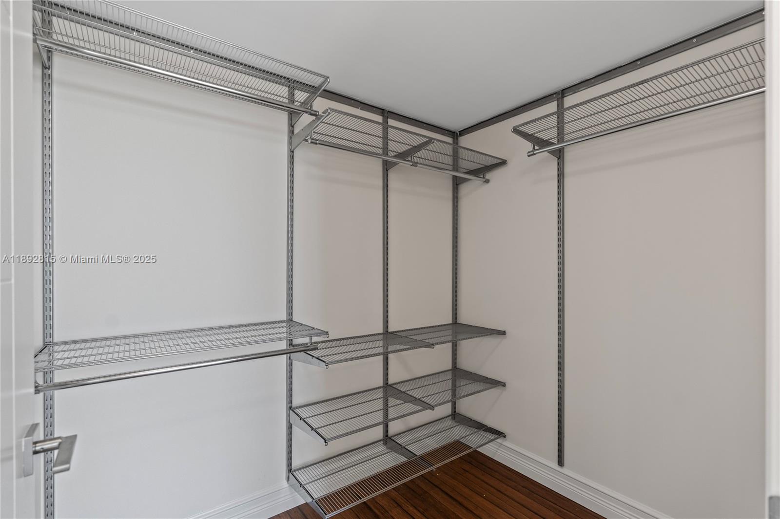 9055 Southwest 73rd Court, Unit 1502 Miami, FL 33156 - Photo 41 of 41 a bathroom with a shower and a glass door