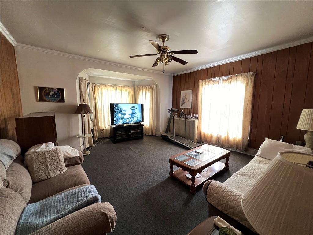 201 Jefferson Street Rochester, PA 15074 - Photo 23 of 23 a living room with furniture and a flat screen tv