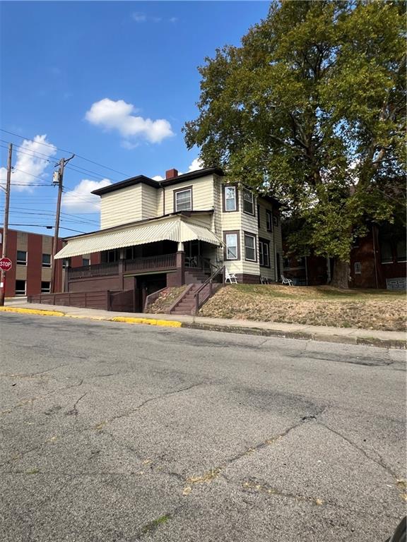 201 Jefferson Street Rochester, PA 15074 - Photo 3 of 23 a view of a house with a snow on the road