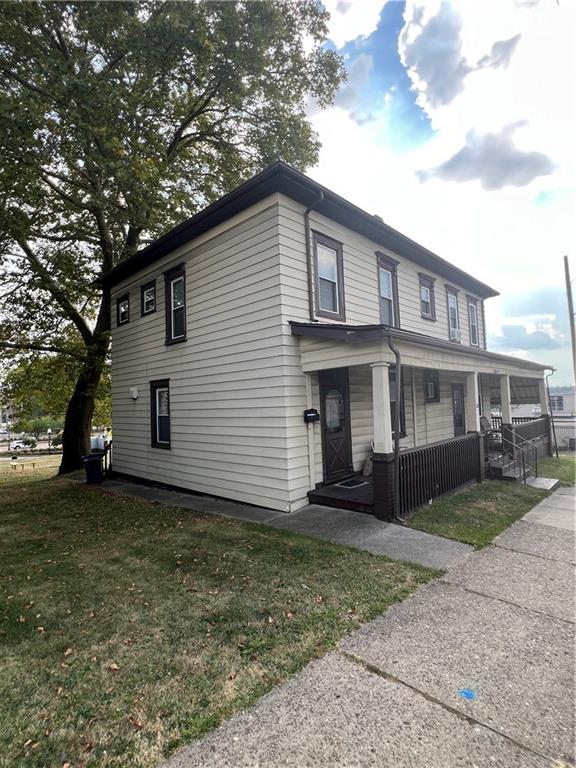 201 Jefferson Street Rochester, PA 15074 - Photo 8 of 23 a view of a house with a yard