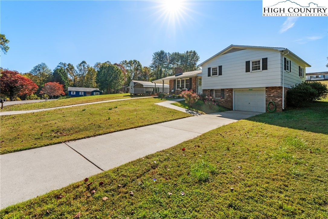 2598 Conner Circle Lenoir, NC 28645 - Photo 26 of 35 a view of house with outdoor space and swimming pool