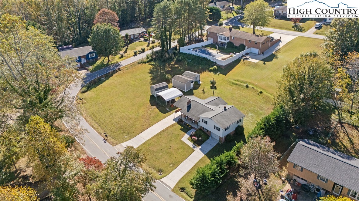 2598 Conner Circle Lenoir, NC 28645 - Photo 33 of 35 an aerial view of residential house with swimming pool