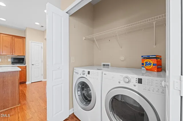 a view of livingroom with washer and dryer