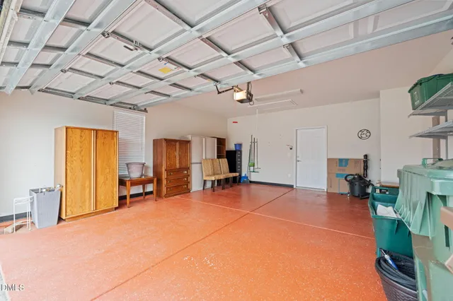 a room with furniture and a large window