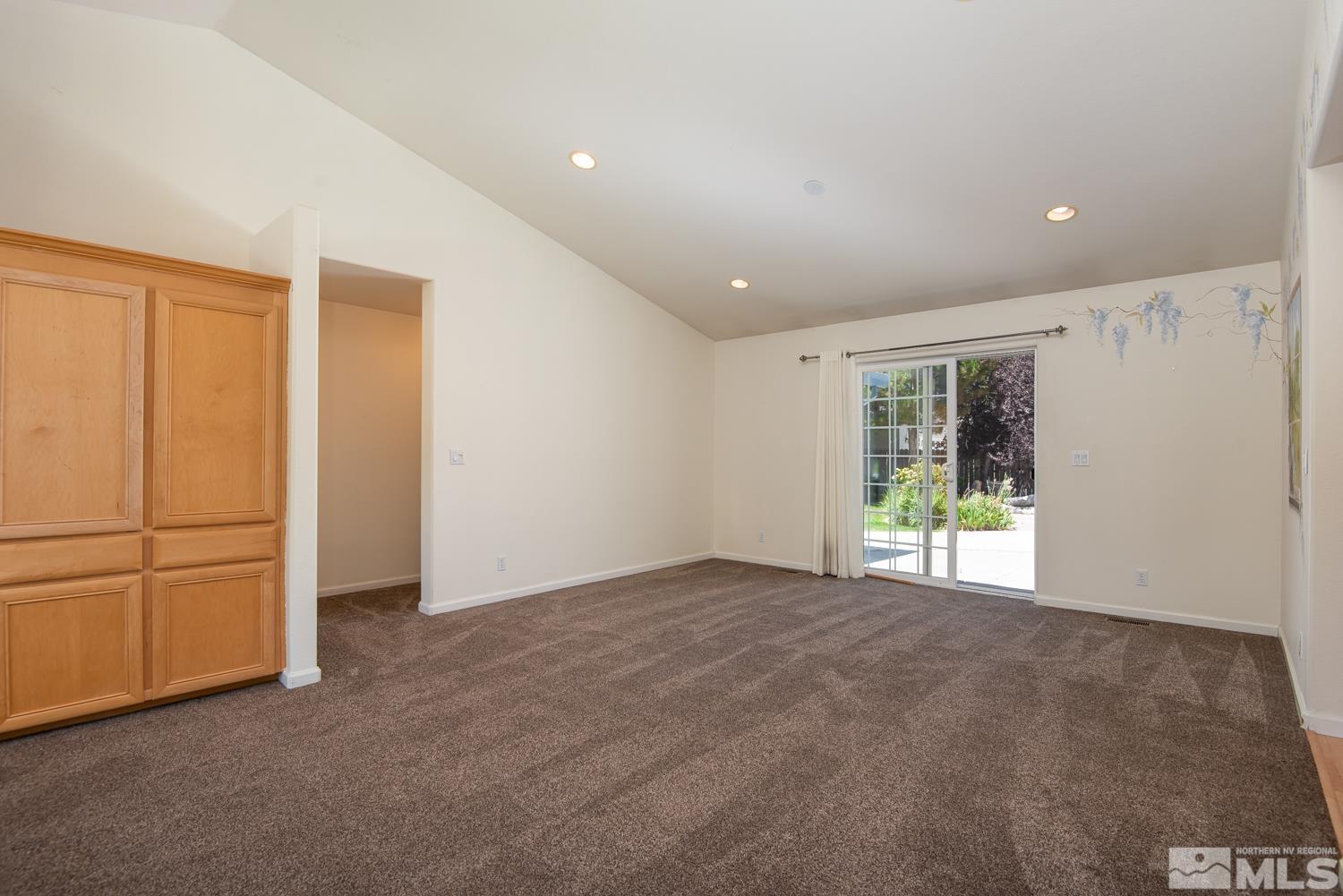 877 Longleaf Place Minden, NV 89423 - Photo 11 of 39 a view of an empty room with a window