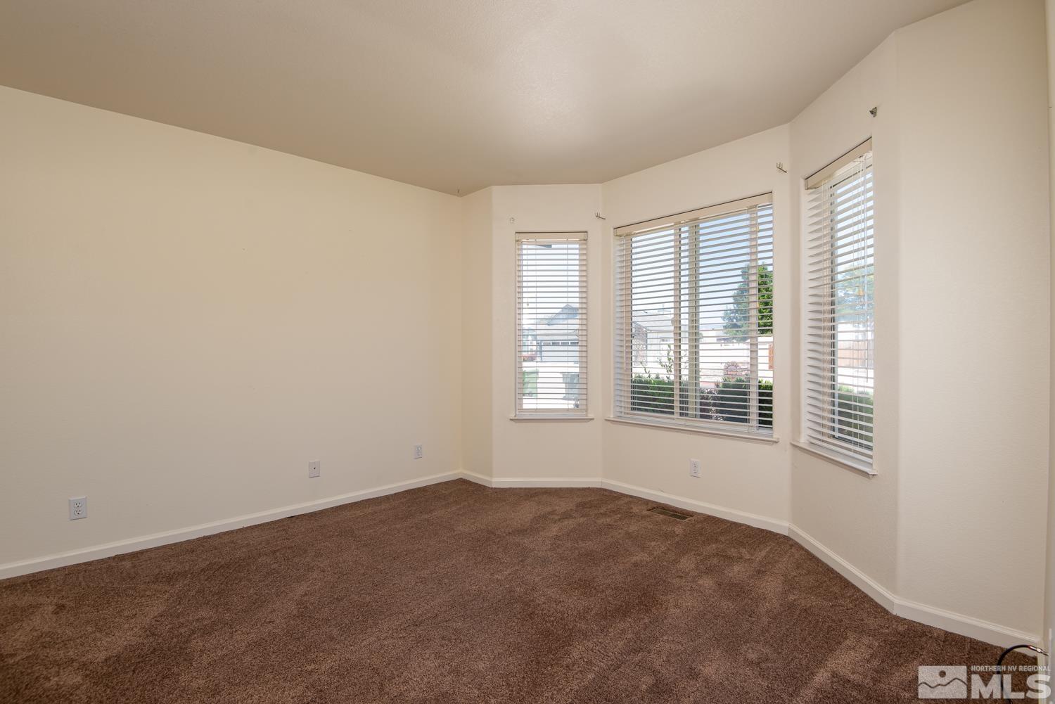 877 Longleaf Place Minden, NV 89423 - Photo 13 of 39 an empty room with a window