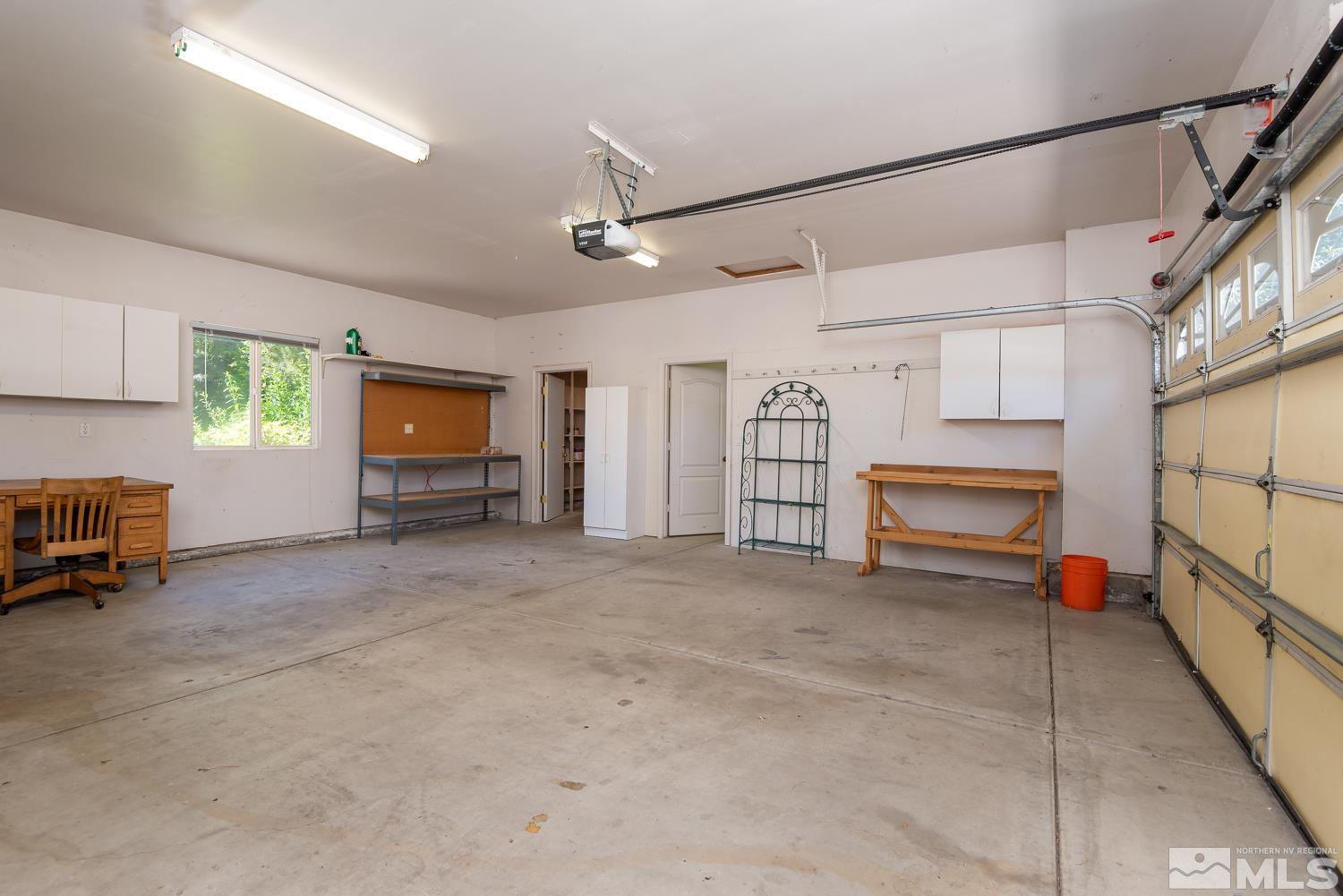 877 Longleaf Place Minden, NV 89423 - Photo 28 of 39 a view of a livingroom with furniture and a window