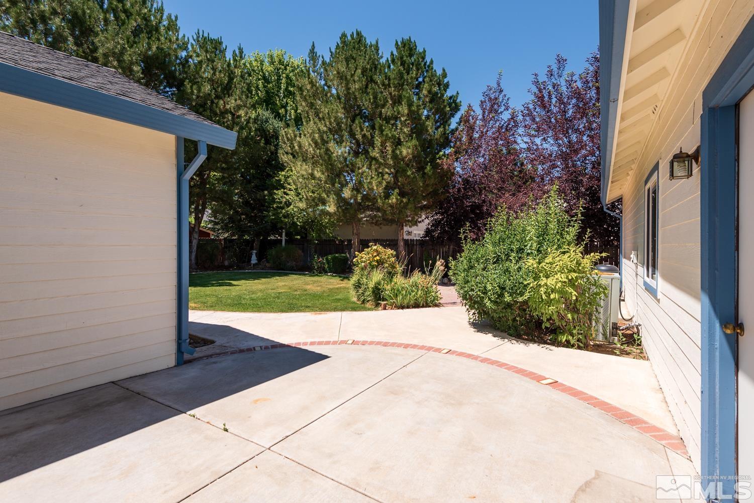 877 Longleaf Place Minden, NV 89423 - Photo 36 of 39 a view of a garden with pathway