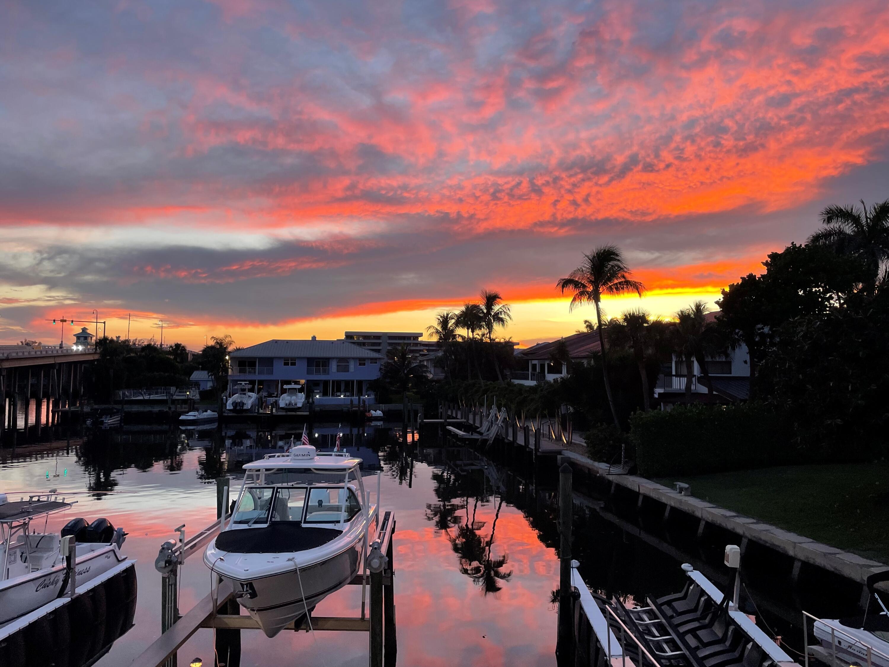 1700 South Ocean Boulevard, Unit 14 Delray Beach, FL 33483 - Photo 1 of 32 a terrace with outdoor seating and city view