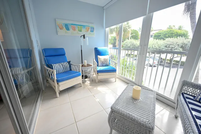 a view of yard with swimming pool outdoor seating and barbeque oven in the back