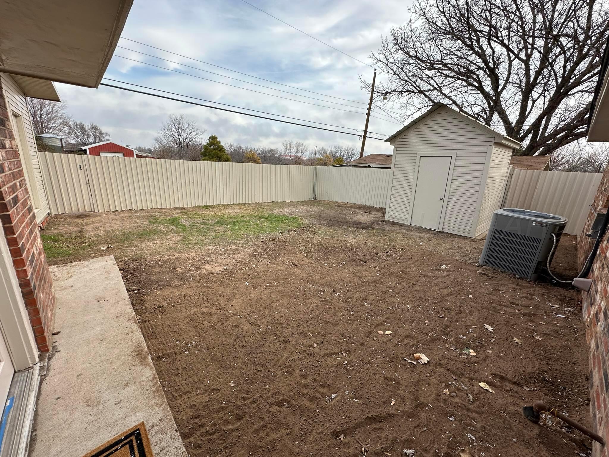 4402 Gary Lane Amarillo, TX 79110 - Photo 18 of 19 a view of a backyard
