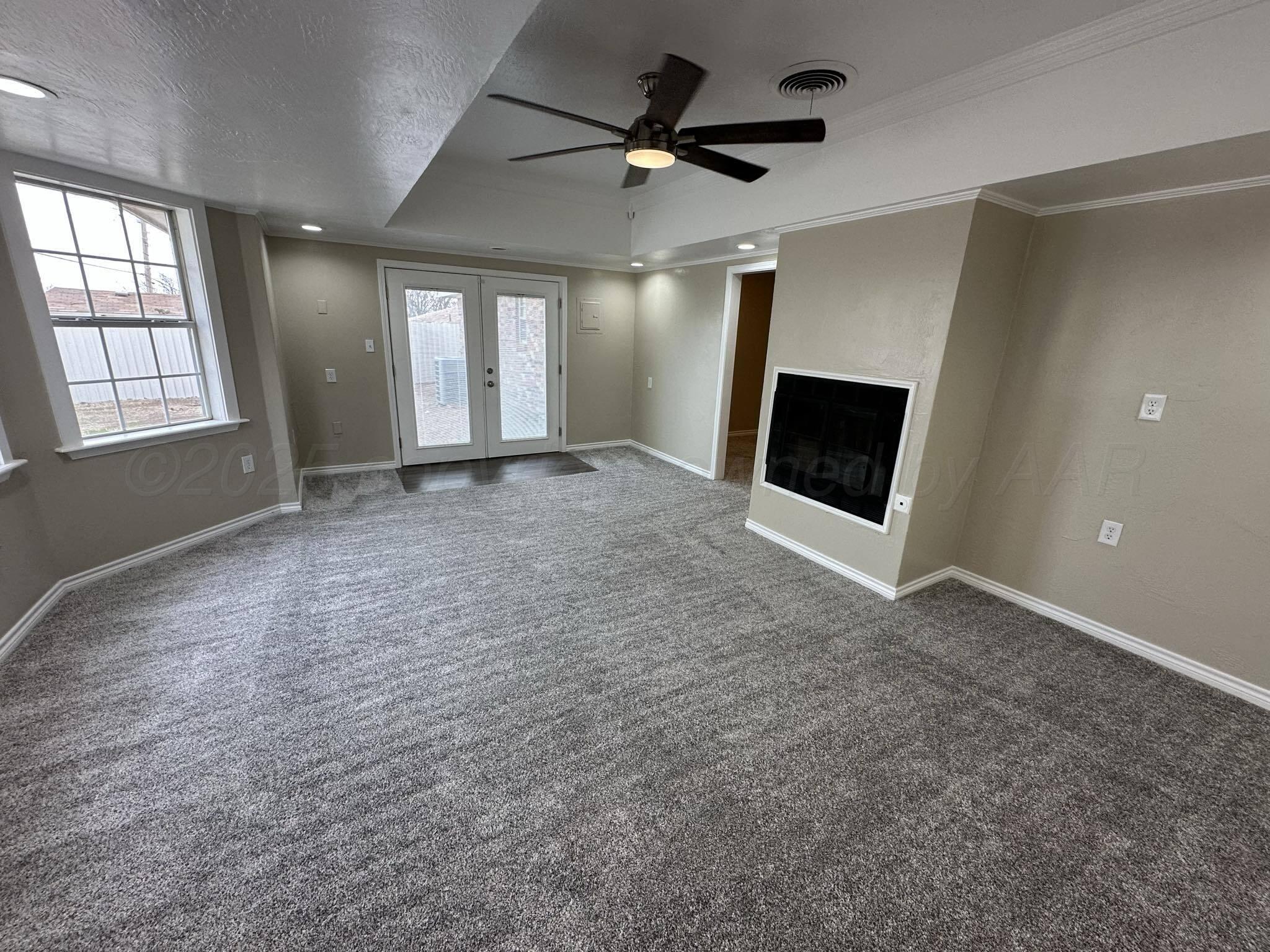 4402 Gary Lane Amarillo, TX 79110 - Photo 8 of 19 a view of a livingroom with a fireplace