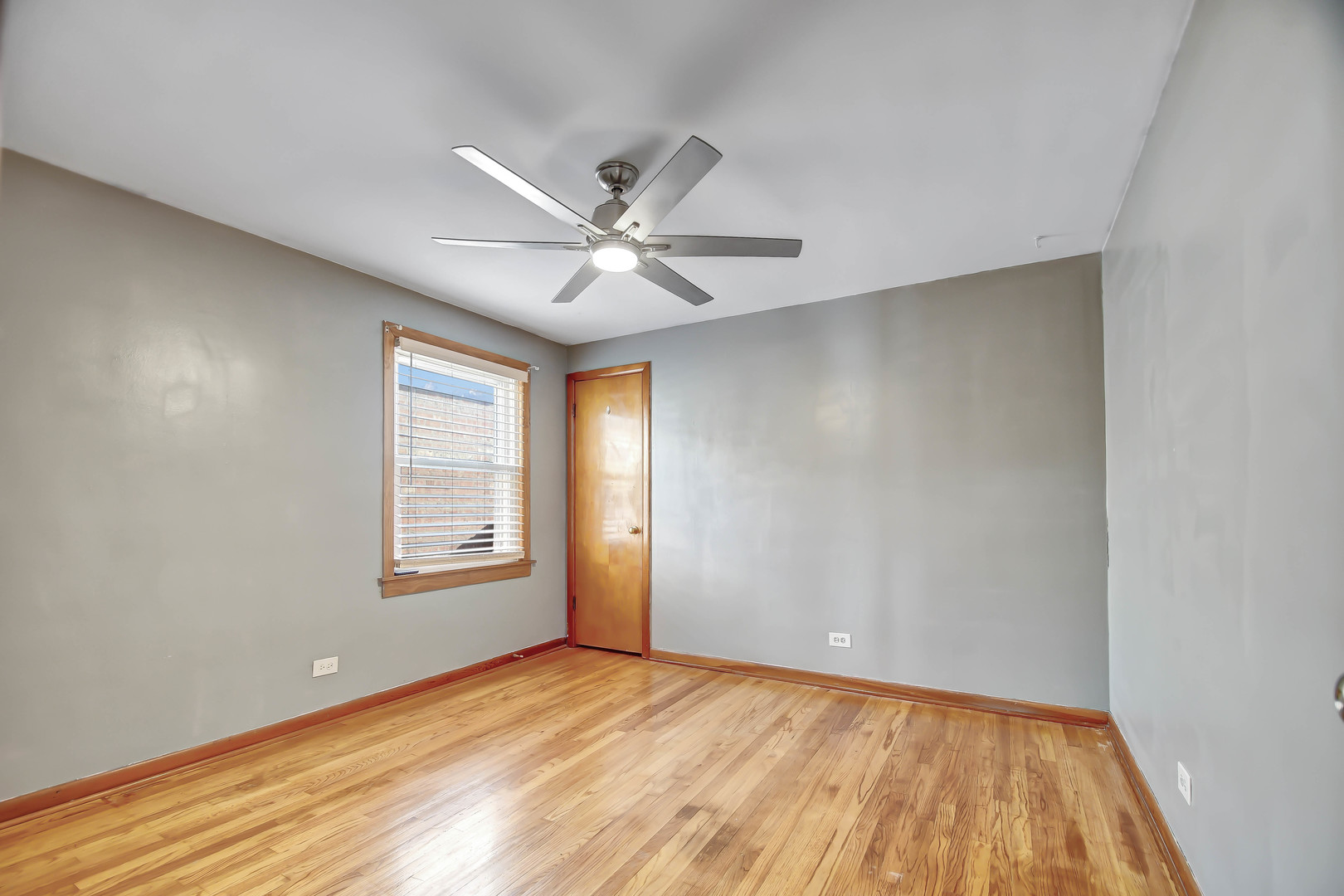 5927 West 64th Place Chicago, IL 60638 - Photo 11 of 23 a view of an empty room with a window