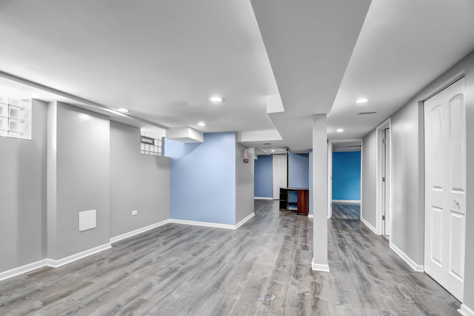 5927 West 64th Place Chicago, IL 60638 - Photo 13 of 23 a view of a big room with wooden floor and windows