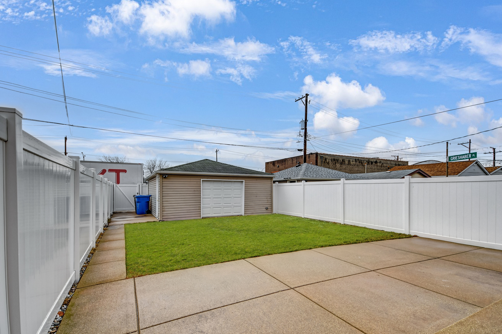 5927 West 64th Place Chicago, IL 60638 - Photo 22 of 23 a view of a yard in front of a building