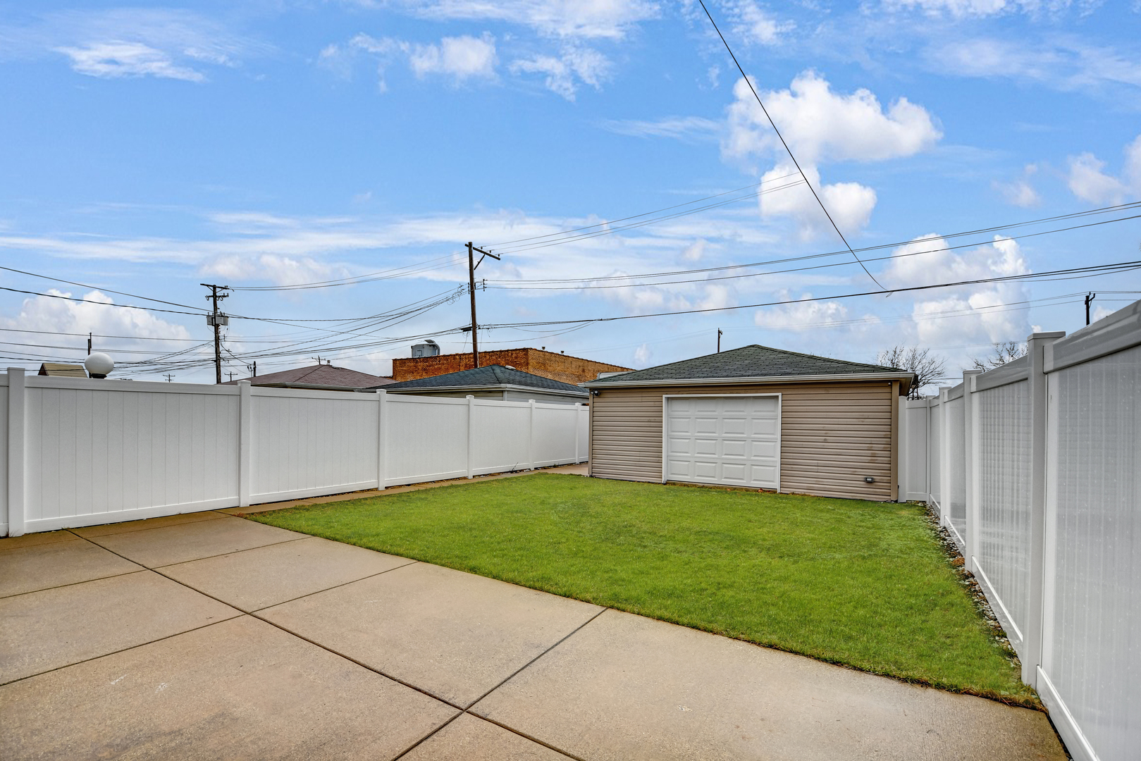 5927 West 64th Place Chicago, IL 60638 - Photo 23 of 23 a view of a backyard with plants