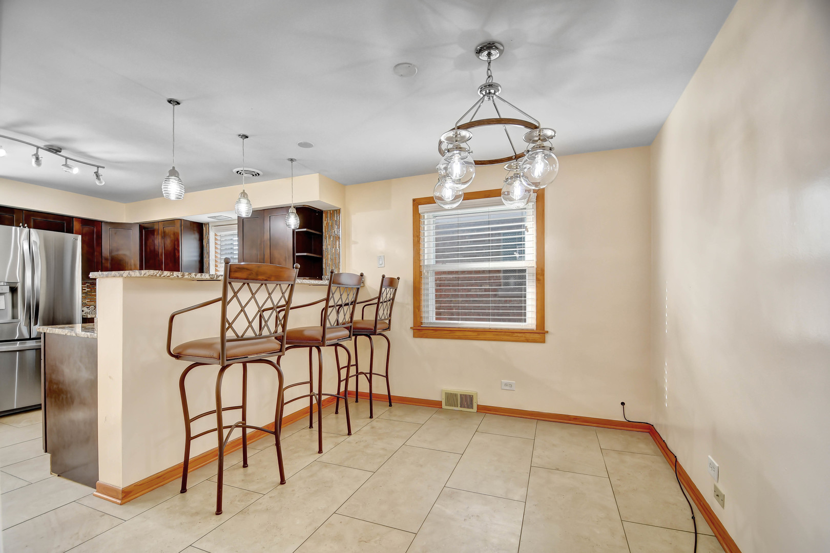 5927 West 64th Place Chicago, IL 60638 - Photo 5 of 23 a view of a dining room with furniture window and outside view