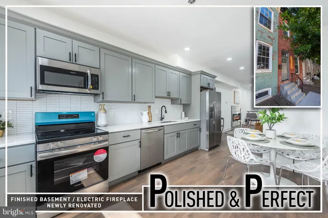 a kitchen with kitchen island granite countertop a sink cabinets and stainless steel appliances