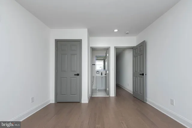 a view of entryway with wooden floor
