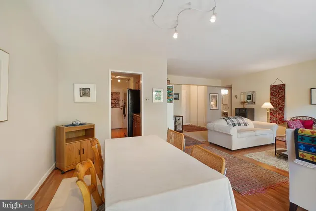 a kitchen with stainless steel appliances granite countertop a refrigerator a sink and dishwasher