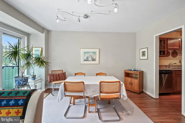 a kitchen with a stove and a refrigerator