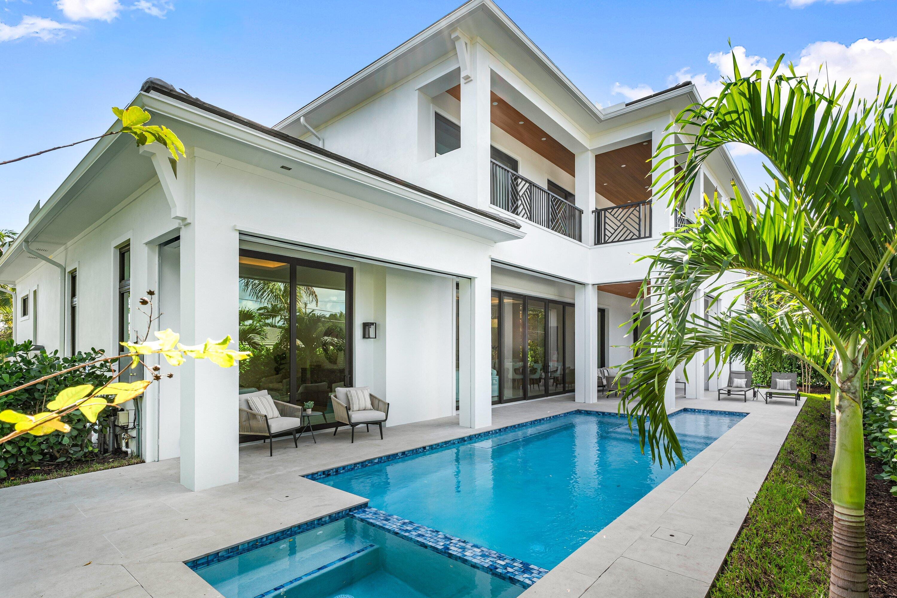 2609 Northeast 27th Way Fort Lauderdale, FL 33306 - Photo 22 of 53 a front view of house and yard with swimming pool