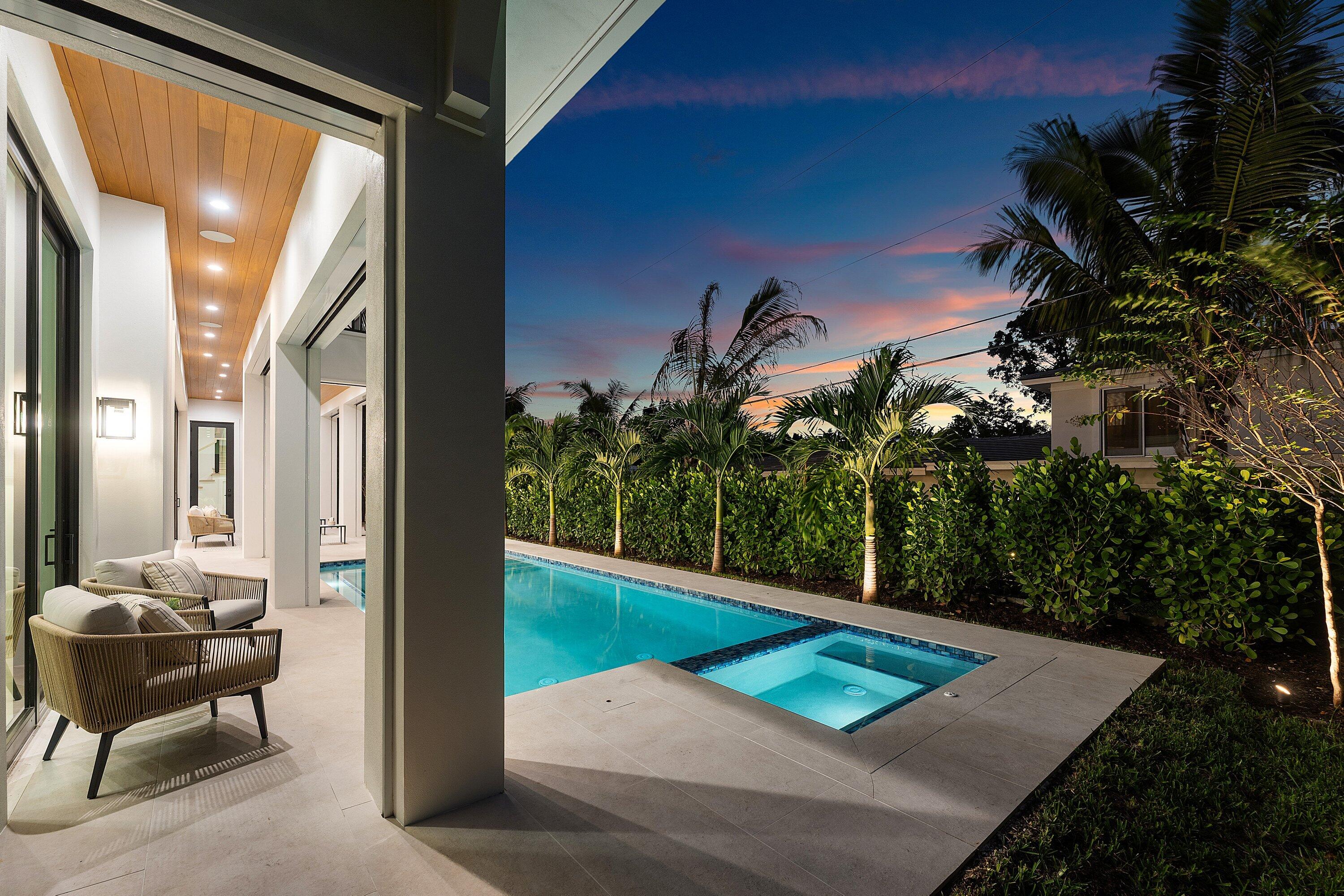 2609 Northeast 27th Way Fort Lauderdale, FL 33306 - Photo 49 of 53 a view of a chairs in a patio
