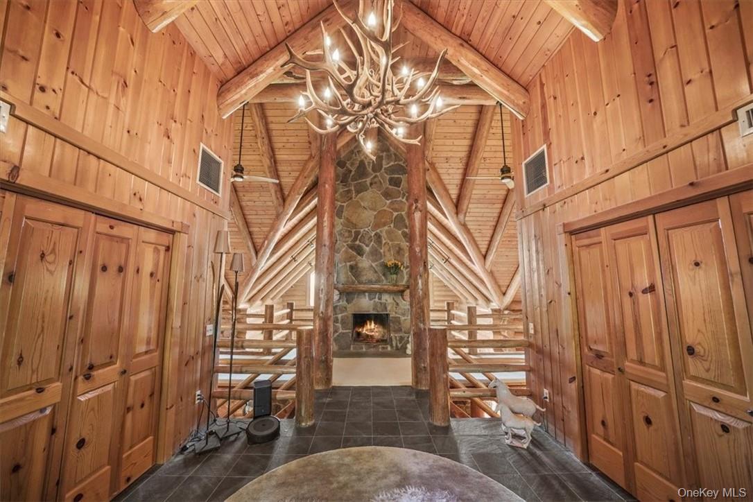 101 Mountain Lodge Road Washingtonville, NY 10992 - Photo 4 of 26 Entrance with stone woodburning fireplace, cathedral ceilings and closets set the stage for the home. You are in for something very special!
