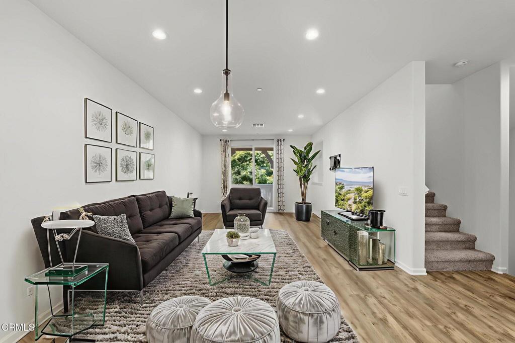 3705 Islander Walk Oxnard, CA 93035 - Photo 13 of 45 a living room with furniture and wooden floor