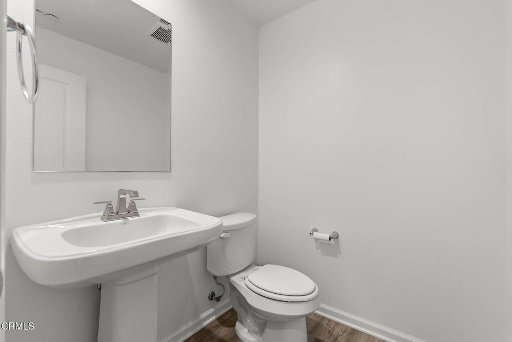 3705 Islander Walk Oxnard, CA 93035 - Photo 18 of 45 a bathroom with a sink and a toilet