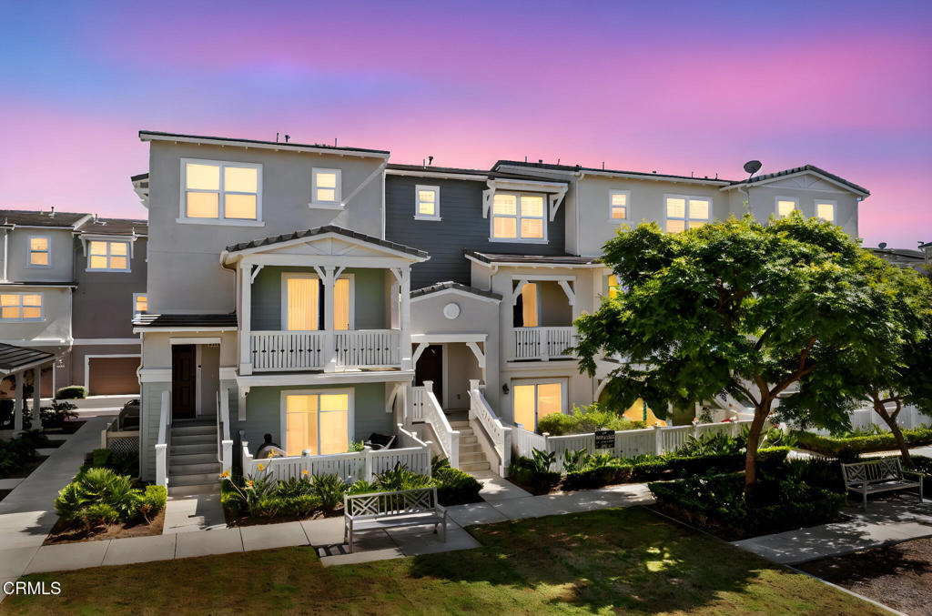 3705 Islander Walk Oxnard, CA 93035 - Photo 2 of 45 a front view of a house with a yard and a tree