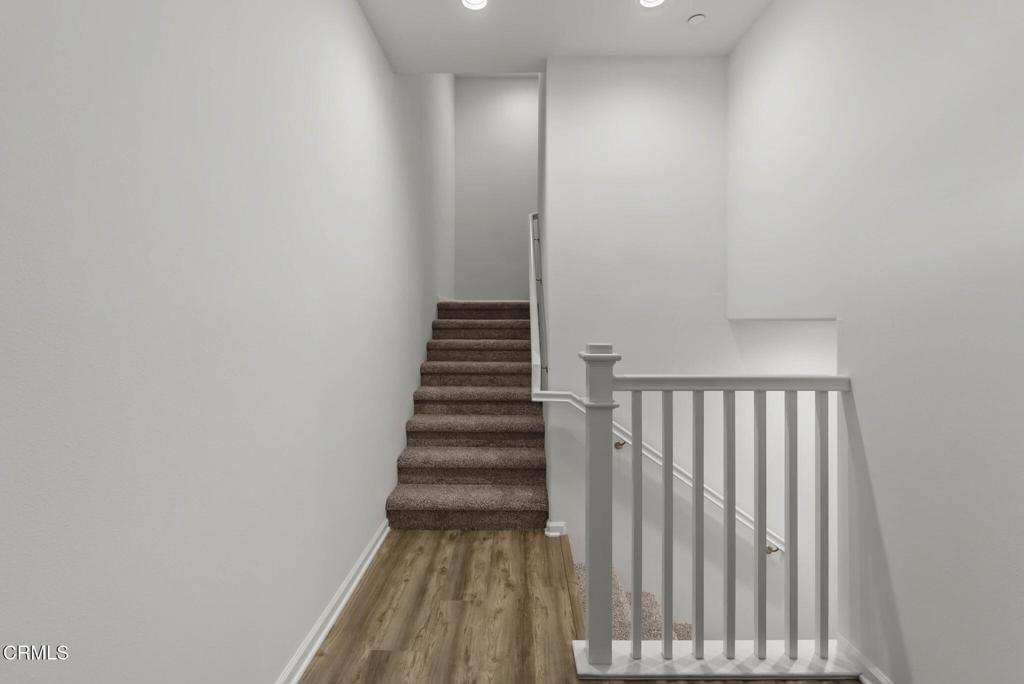 3705 Islander Walk Oxnard, CA 93035 - Photo 5 of 45 a view of a hallway with stairs
