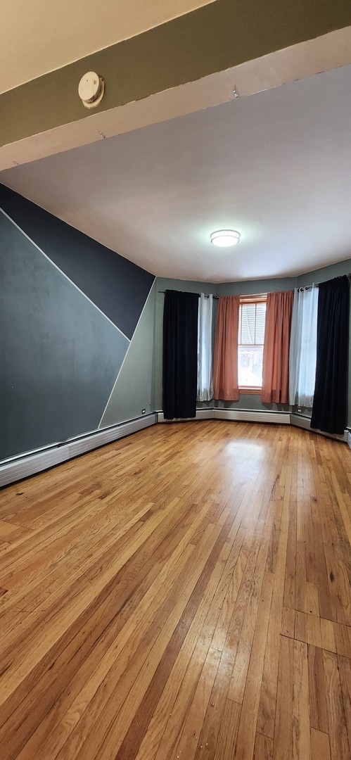4450 West Altgeld Street, Unit 1 Chicago, IL 60639 - Photo 25 of 29 a view of an empty room and window