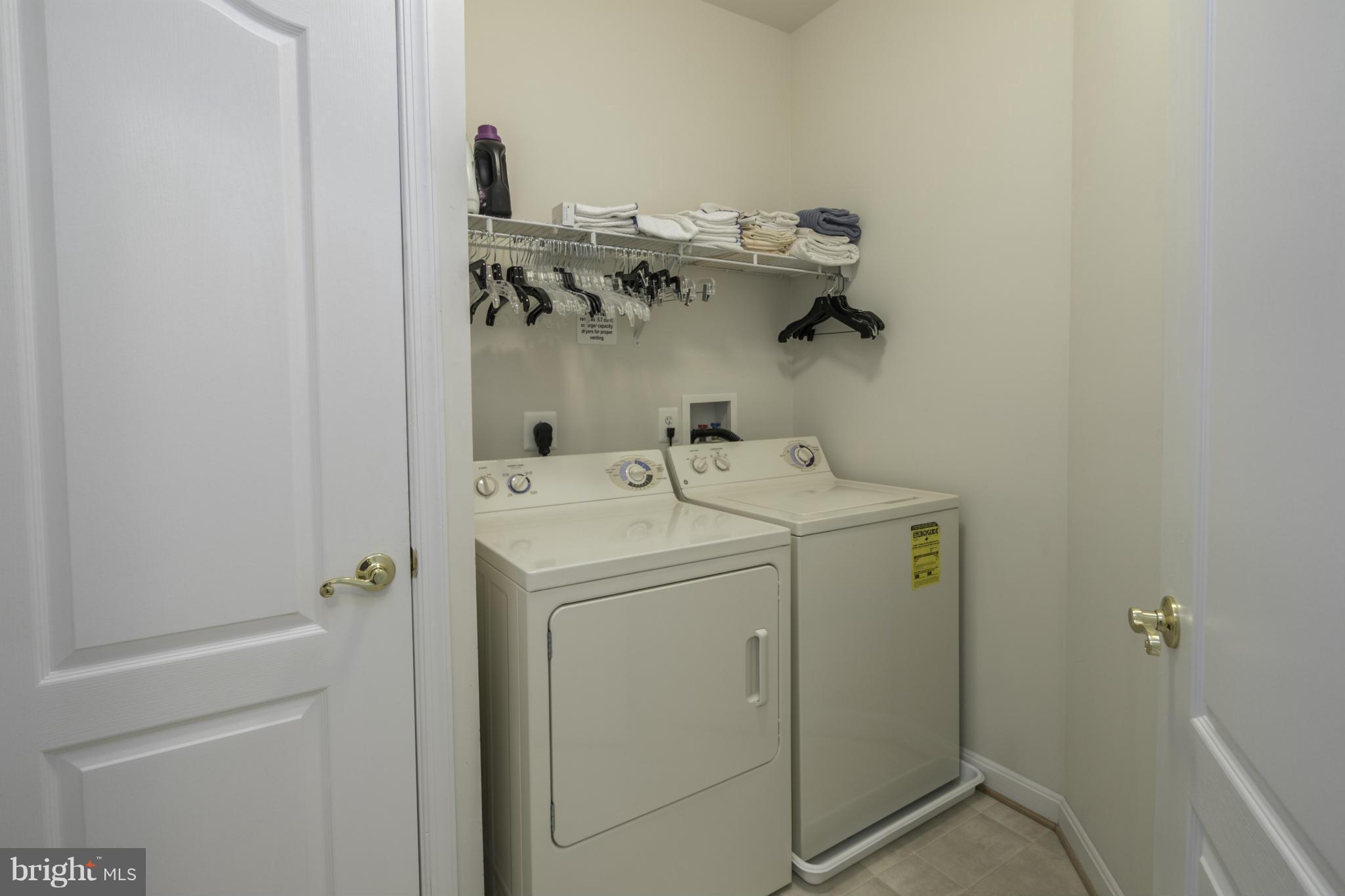 8601 Roaming Ridge Way, Unit 406 Odenton, MD 21113 - Photo 22 of 30 Laundry with Full Size Washer & Dryer