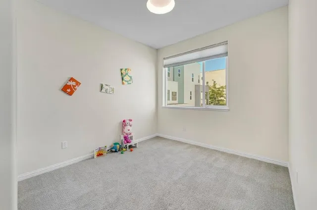 a kitchen with stainless steel appliances granite countertop a refrigerator a stove a sink and dishwasher