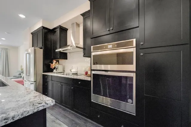 a kitchen with a sink and cabinets