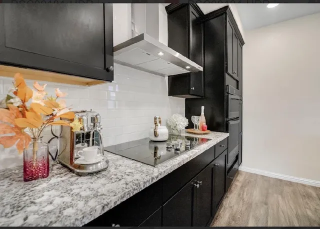 a view of small space with wooden floor