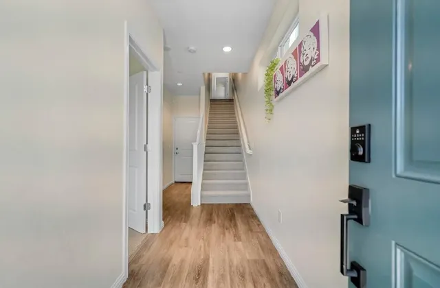a view of entryway with wooden floor