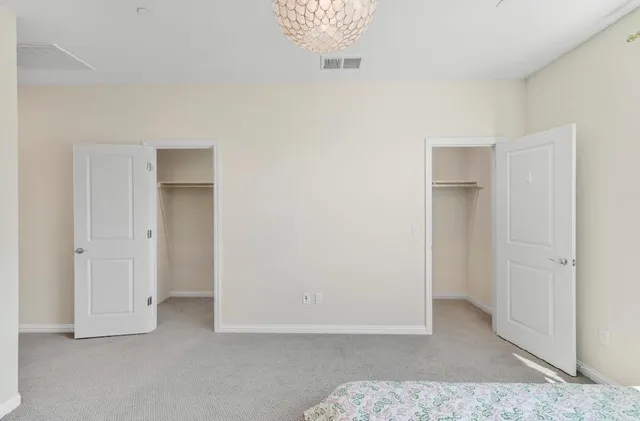 a view of balcony with outdoor seating and city view
