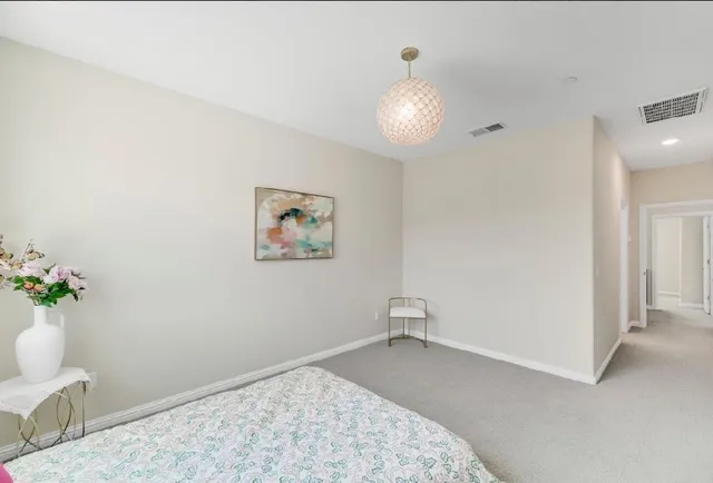 a view of swimming pool from a balcony