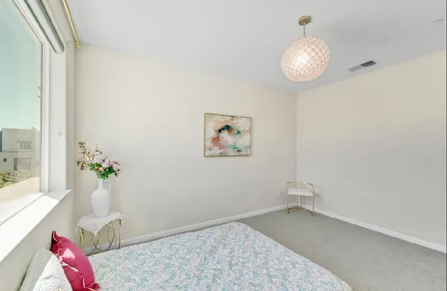 a view of swimming pool from a balcony