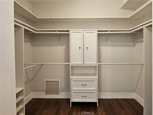 a view of an empty walk in closet