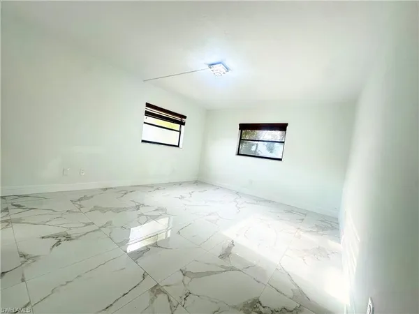 an empty room with a bathroom