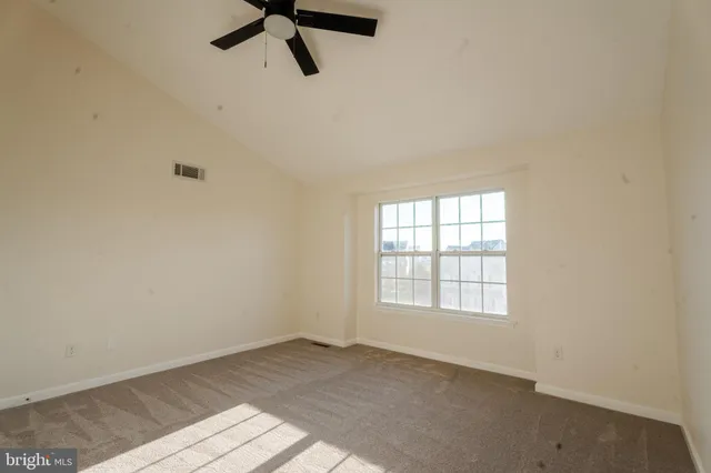 a view of a window in an empty room
