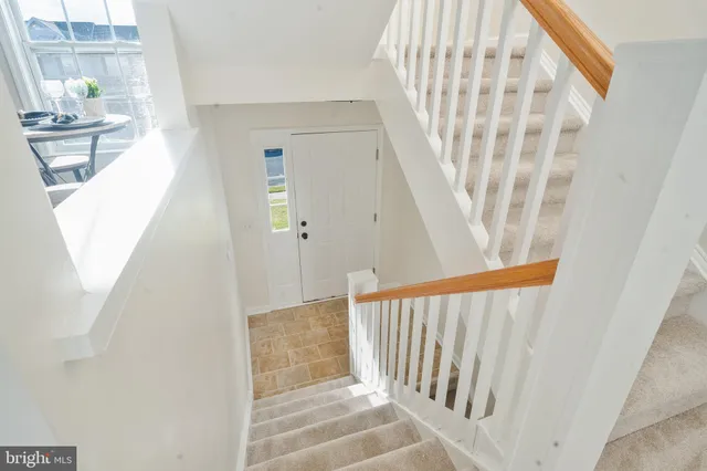 a view of a hallway with windows