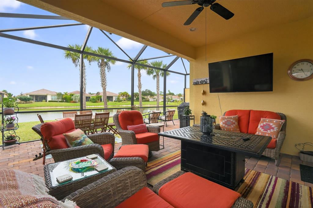 21044 Southwest Modena Way Port St. Lucie, FL 34986 - Photo 36 of 42 a outdoor living space with furniture and garden view