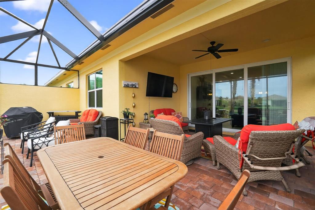 21044 Southwest Modena Way Port St. Lucie, FL 34986 - Photo 38 of 42 a bedroom with furniture and a large window