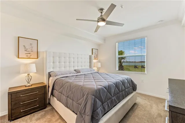 a bathroom with a granite countertop sink a mirror and a shower